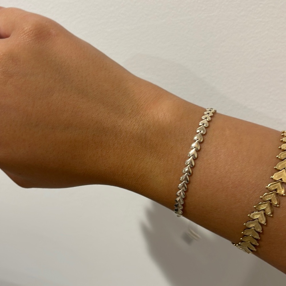 Silver heart adjustable bracelet.